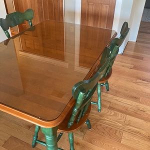Glass top extension dining table with chairs